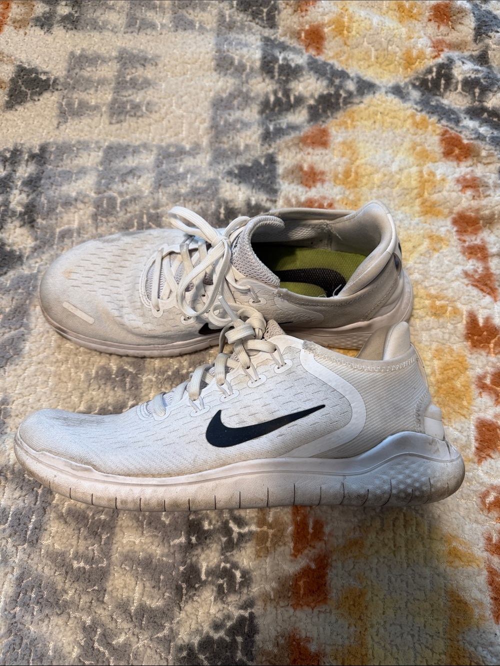 Nike Men's White Athletic Running Shoes with Black Swoosh